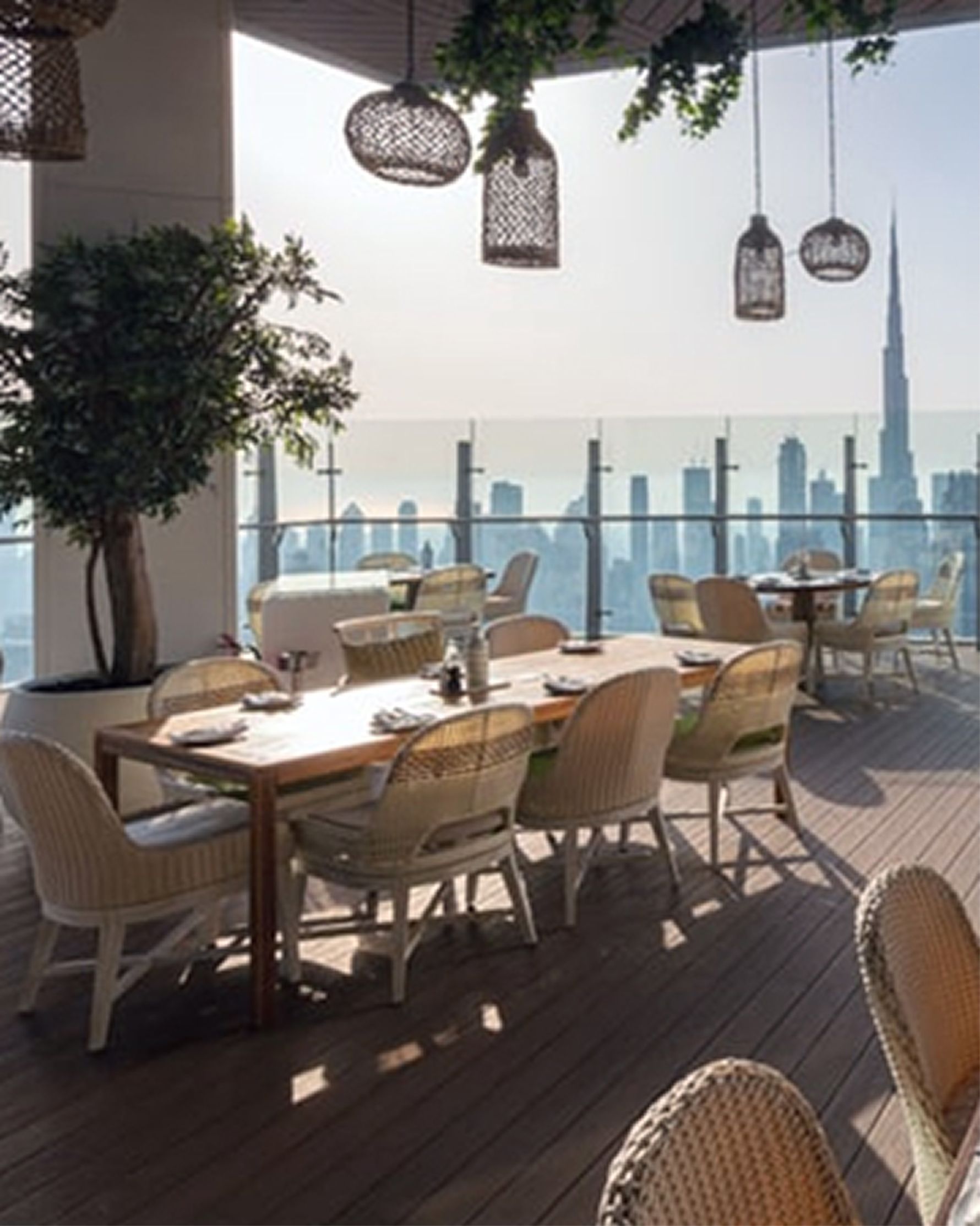 Outdoor terrace dining with city views